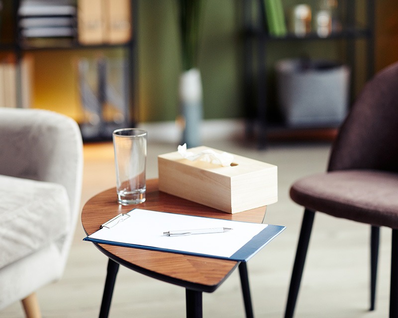 Box of tissues and clipboard for trauma counseling in texas