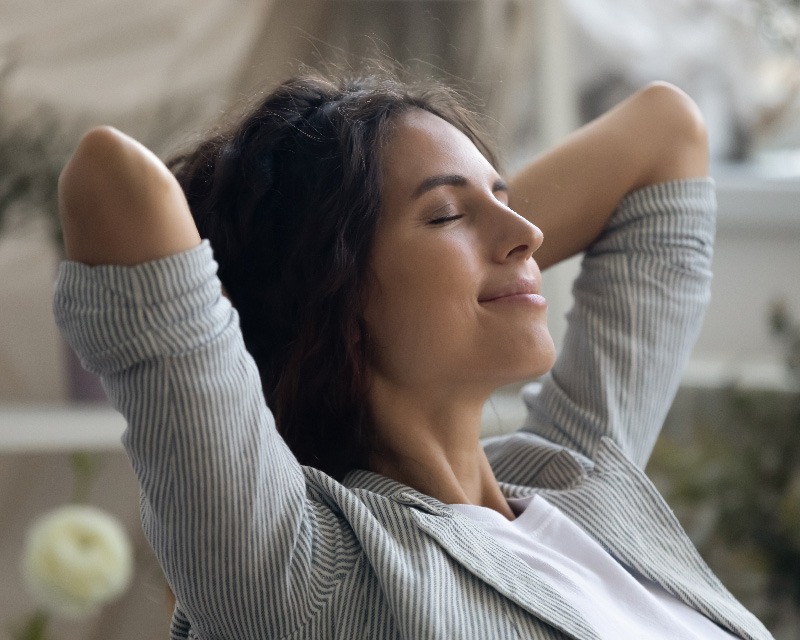 Woman relaxed and calm after Vibroacoustic Therapy in Texas