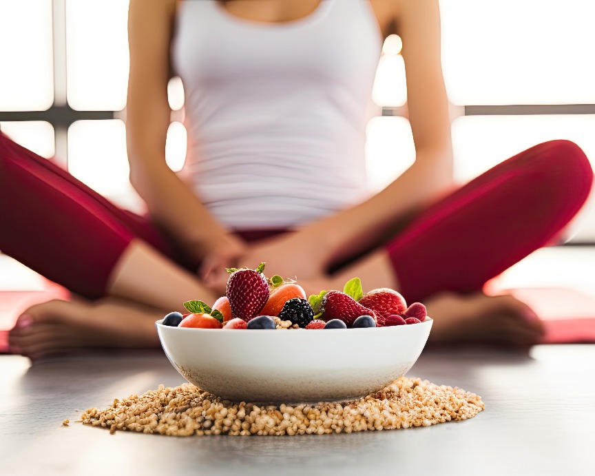 Bowl of berries in front of young woman; Eating disorder treatment in Houston